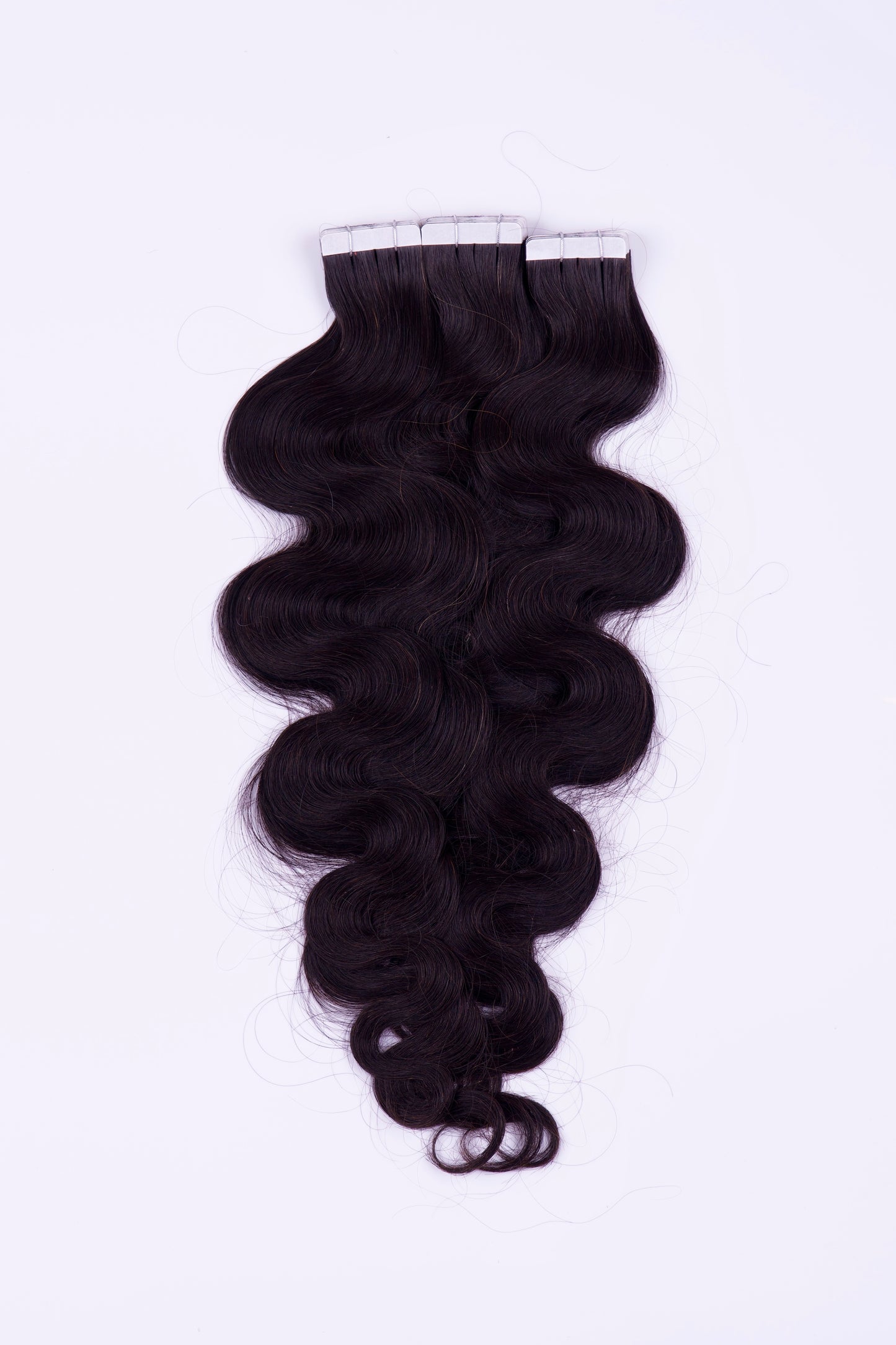 Tape In Wavy Extensions